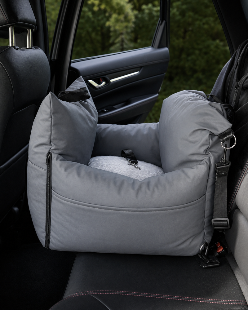 Grey Pavero dog travel bed placed on car back seat